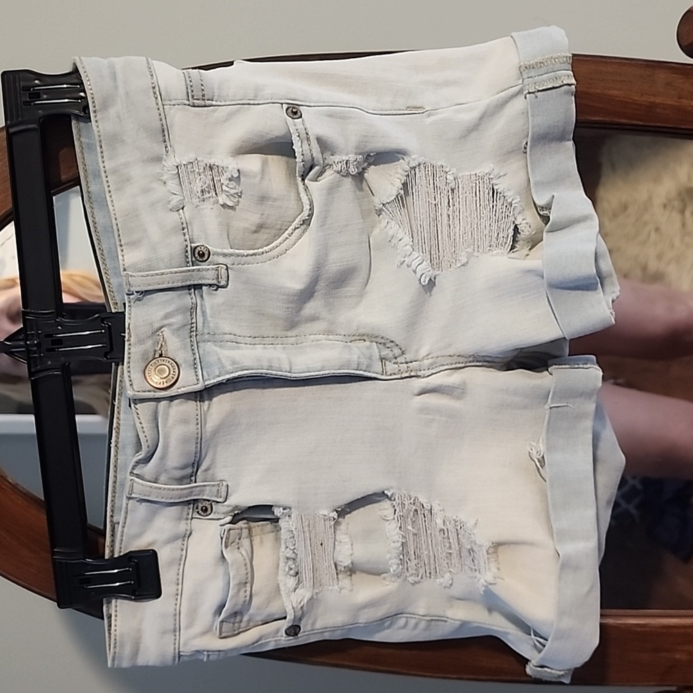 Aero light wash distressed denim shorts